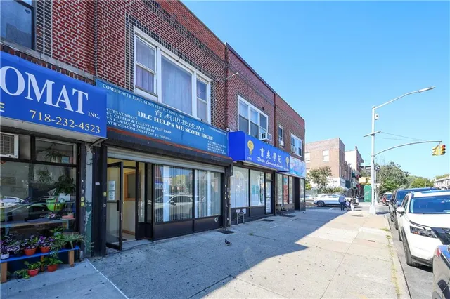 a bedroom with bed and window