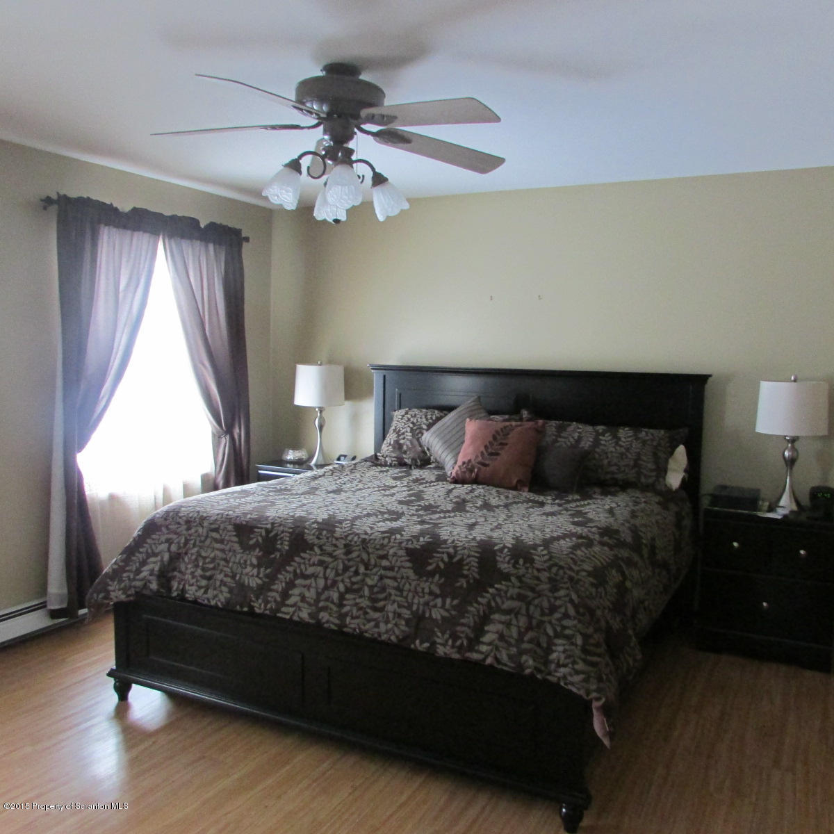 73 Taylor Road Montrose, PA 18801 - Photo 15 of 26 a bedroom with a bed and a window