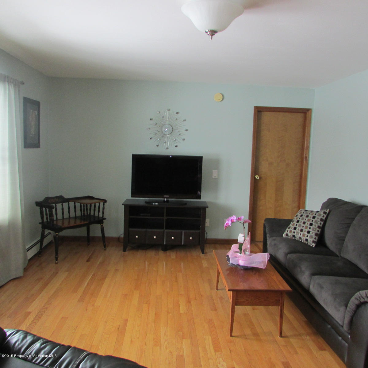 73 Taylor Road Montrose, PA 18801 - Photo 3 of 26 a living room with furniture and a flat screen tv