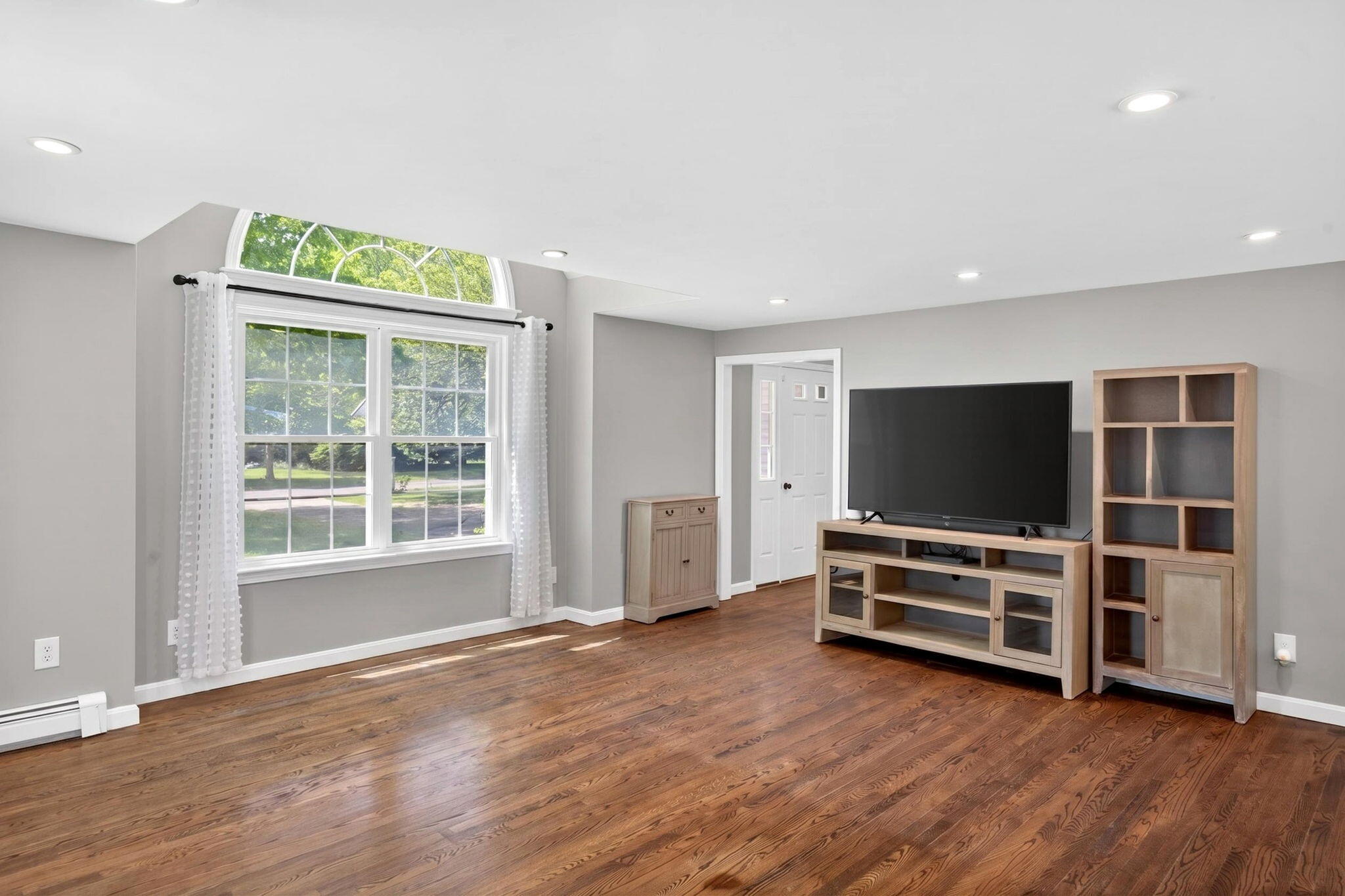 12 Sarah Lawrence Road Sandwich, MA 02563 - Photo 9 of 54 a view of room with wooden floor and windows