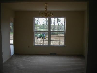 formal dining room with deep windows.