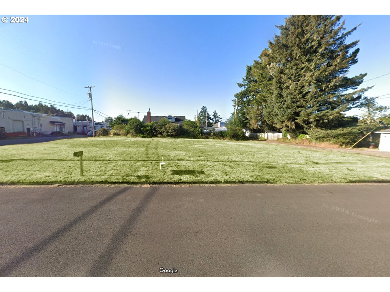 Maple Street, Unit 7600 Florence, OR 97439 - Photo 5 of 13 a view of a yard with a house
