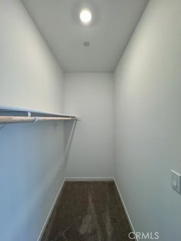 a view of a backyard with table and chairs