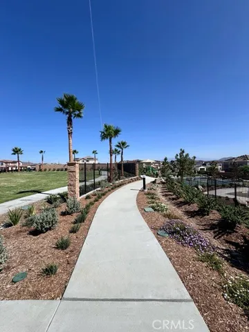a view of a lake with a yard