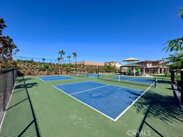 a view of a swimming pool with a chairs