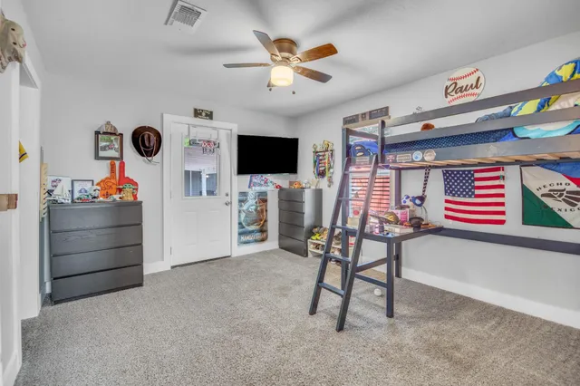 a workspace with furniture and window