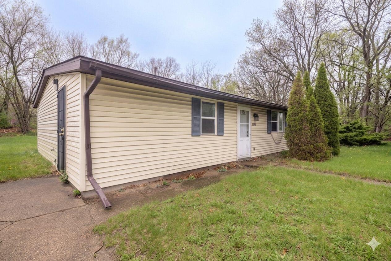 2280 Roosevelt Place Gary, IN 46404 - Photo 2 of 14 a view of a house with a backyard