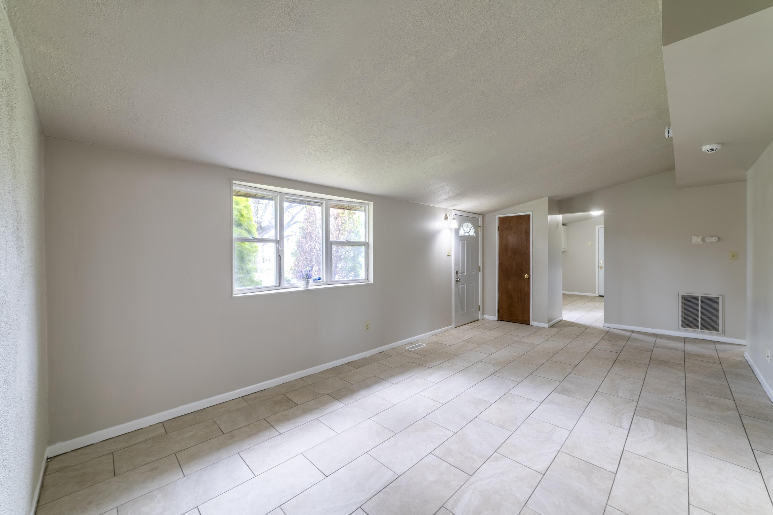 2280 Roosevelt Place Gary, IN 46404 - Photo 5 of 14 a view of an empty room with window and closet area