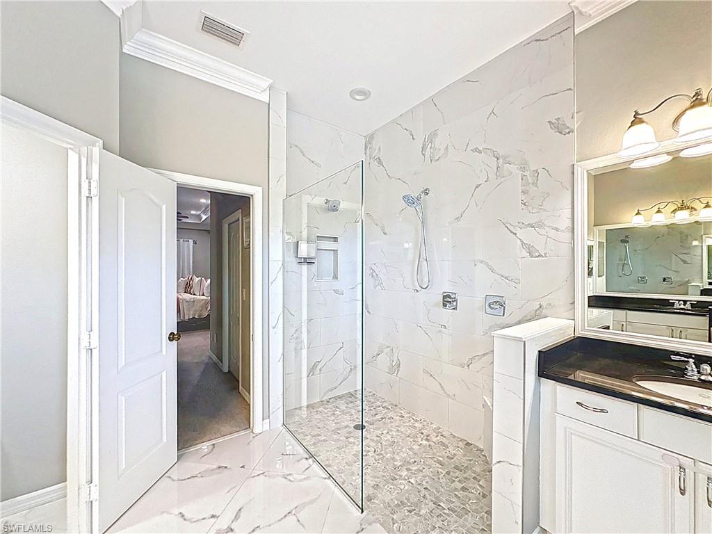 3032 Via Rialto Street Fort Myers, FL 33905 - Photo 11 of 26 a spacious bathroom with a shower and a sink