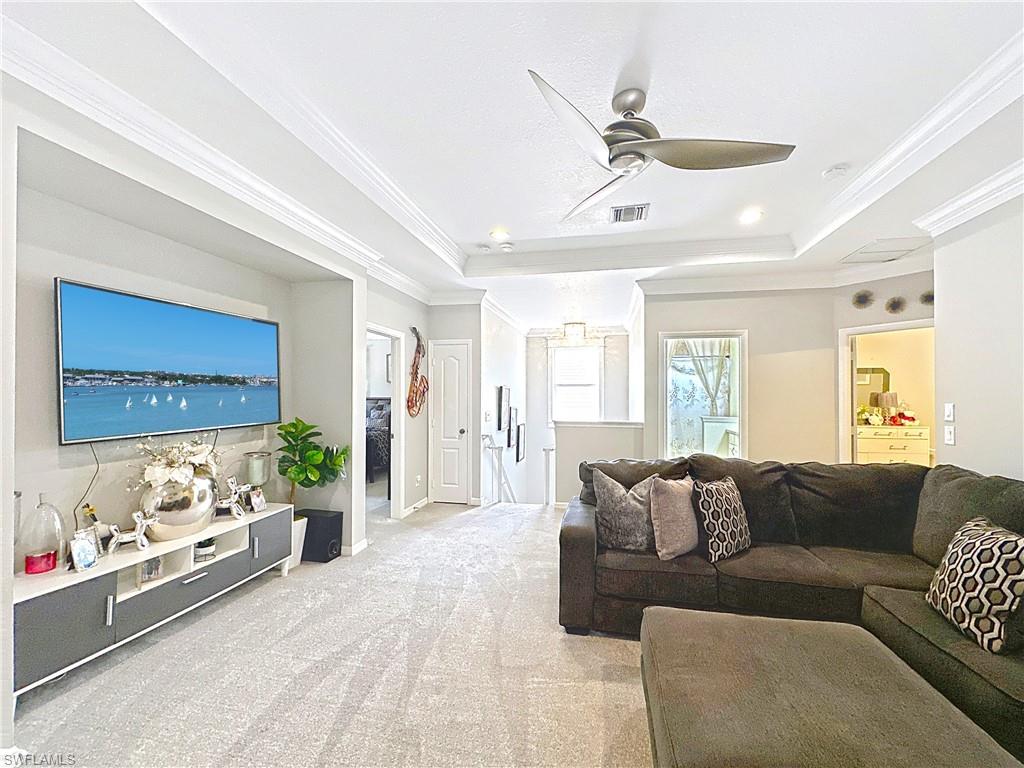 3032 Via Rialto Street Fort Myers, FL 33905 - Photo 12 of 26 a living room with furniture and a large window