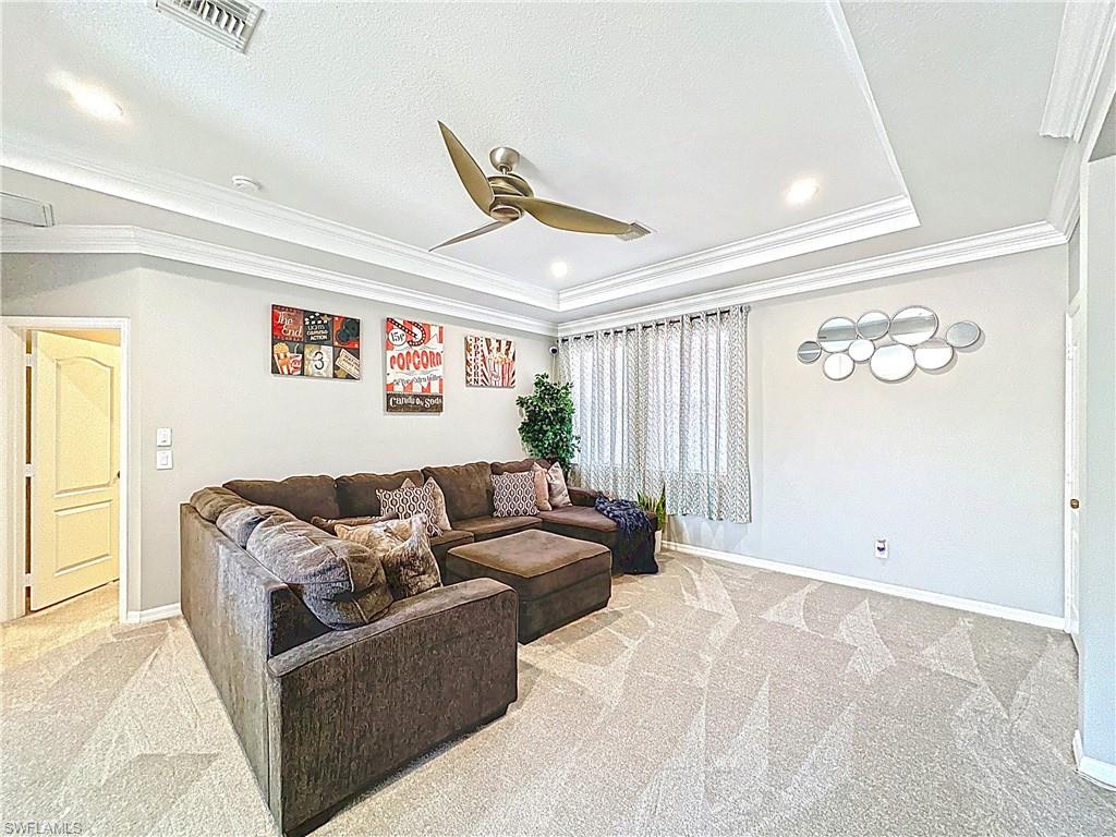 3032 Via Rialto Street Fort Myers, FL 33905 - Photo 13 of 26 a living room with furniture and a large window