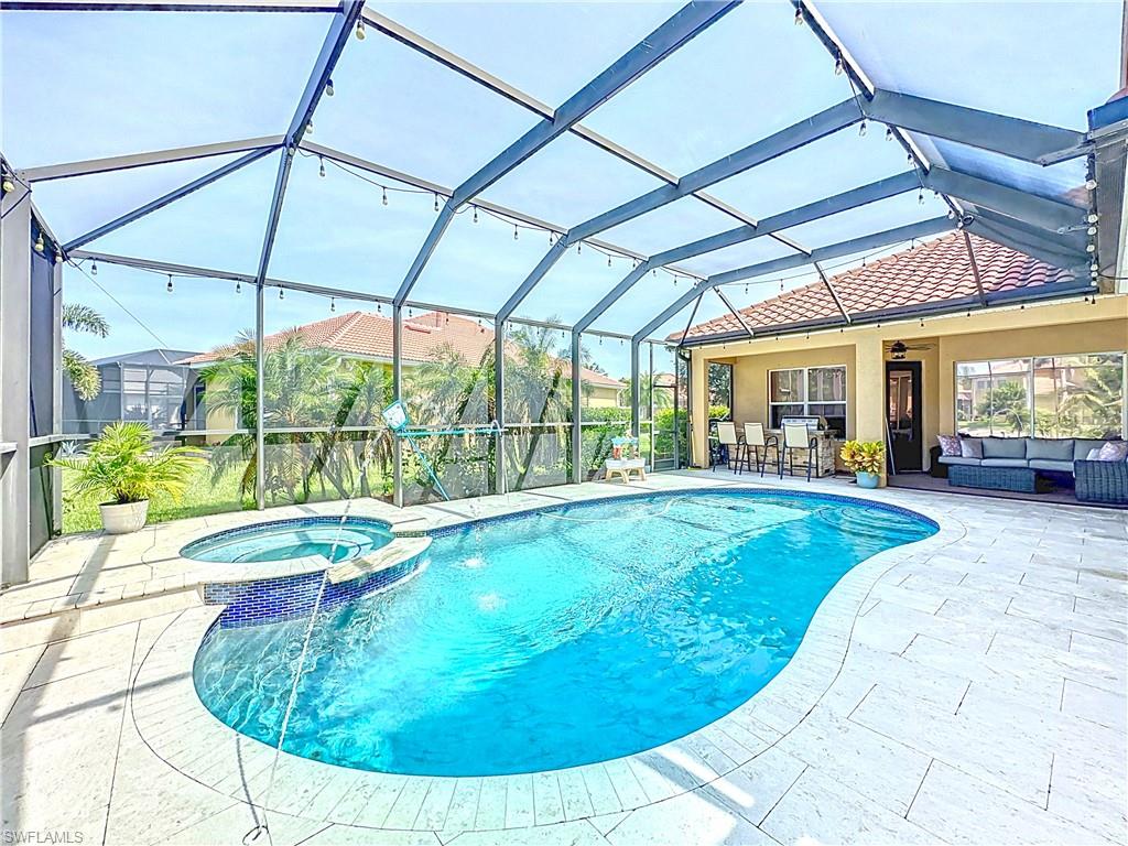 3032 Via Rialto Street Fort Myers, FL 33905 - Photo 22 of 26 a view of a swimming pool with an outdoor seating