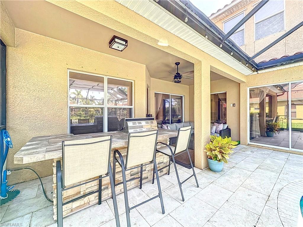3032 Via Rialto Street Fort Myers, FL 33905 - Photo 23 of 26 a dining area with furniture and a potted plant