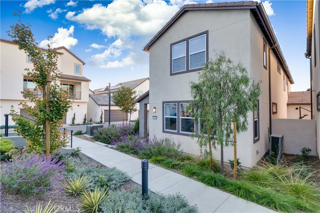 a house view with a garden space