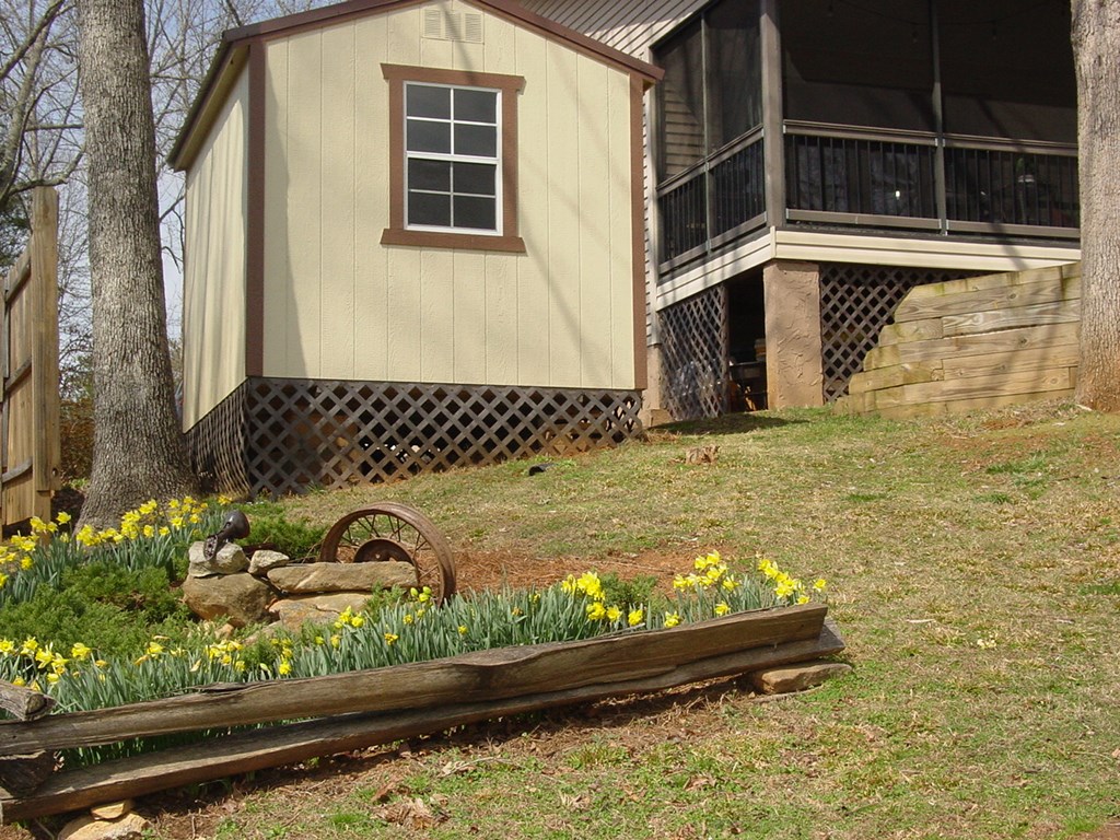 5170 Pine Crest Road Young Harris, GA 30582 - Photo 11 of 46 a front view of a house with a yard