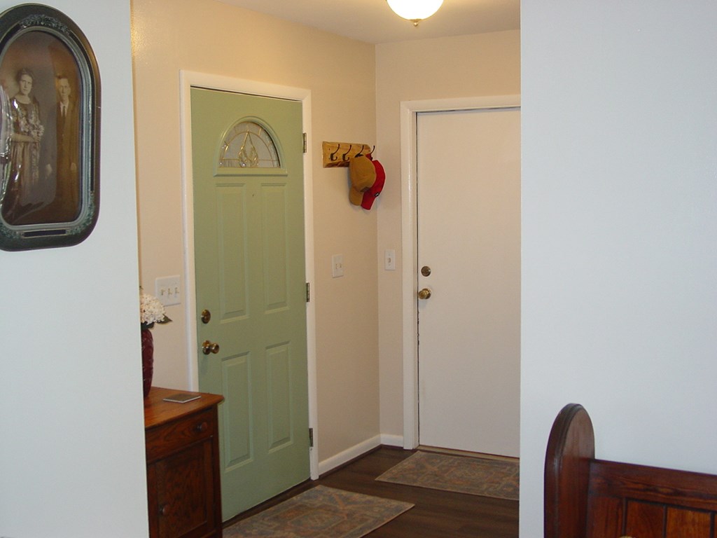 5170 Pine Crest Road Young Harris, GA 30582 - Photo 21 of 46 a view of a hallway with wooden floor