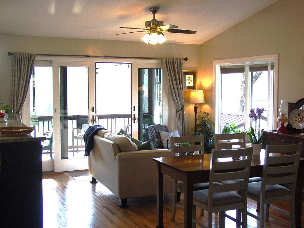 5170 Pine Crest Road Young Harris, GA 30582 - Photo 36 of 46 a living room with furniture and floor to ceiling windows