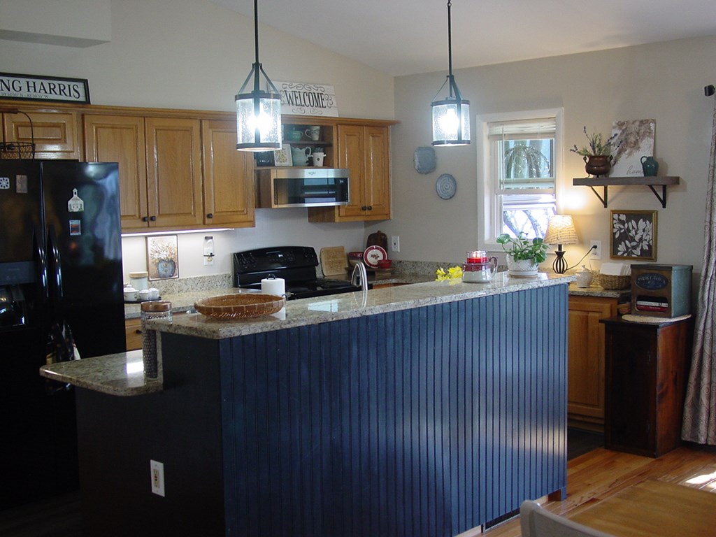 5170 Pine Crest Road Young Harris, GA 30582 - Photo 40 of 46 a kitchen with a refrigerator and a stove