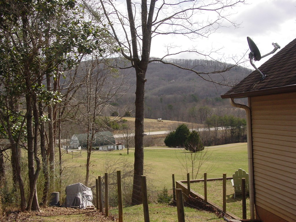 5170 Pine Crest Road Young Harris, GA 30582 - Photo 5 of 46 a view of a lake from a balcony
