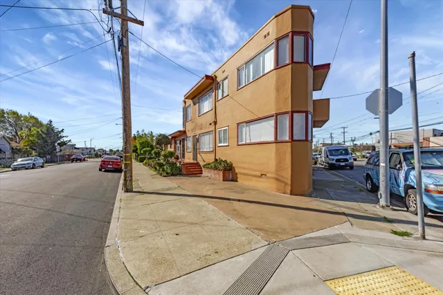 a view of a street with cars
