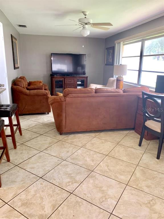 14424 Neptune Road Seminole, FL 33776 - Photo 10 of 32 Separate Family Room