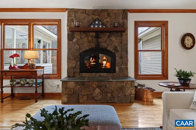 a large kitchen with stainless steel appliances granite countertop a stove and a sink