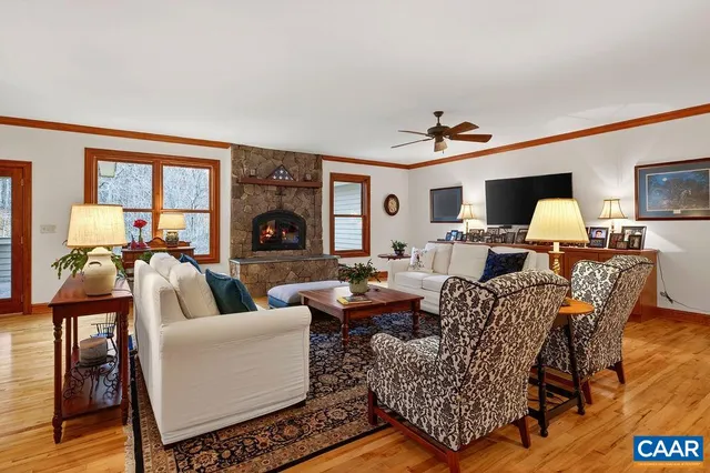 a kitchen with granite countertop a sink and a wooden cabinets