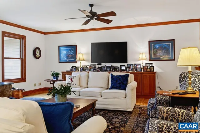 a kitchen with granite countertop stainless steel appliances stove top oven and cabinets