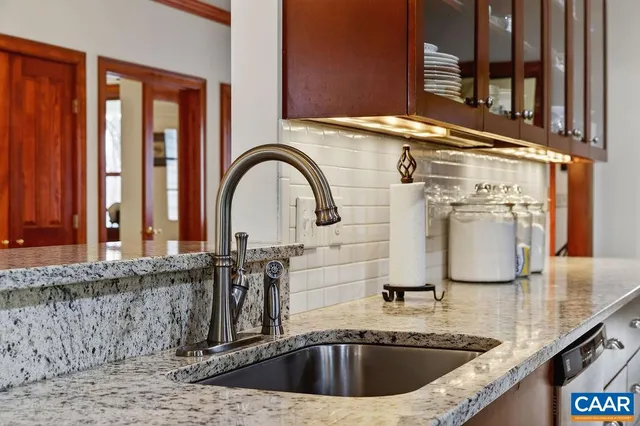 a bathroom with a toilet and a sink