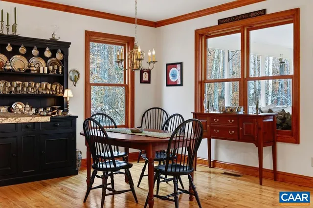 a bed room with furniture and a ceiling fan