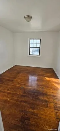 a view of an ocean & window in a room