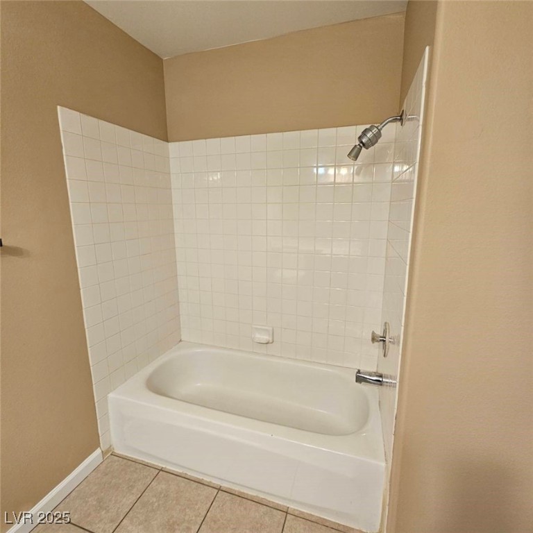 1008 Venetian Hills Lane Las Vegas, NV 89144 - Photo 17 of 18 Bathroom featuring tile patterned floors and bathing tub / shower combination