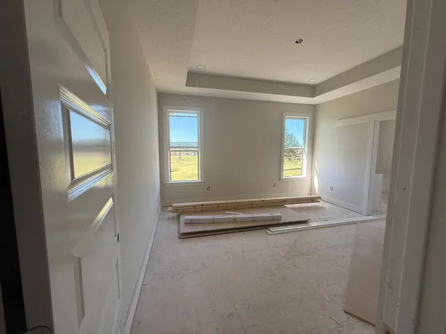 an empty room with windows