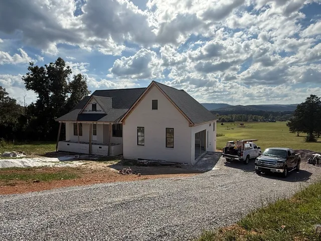 a house view with a garden space