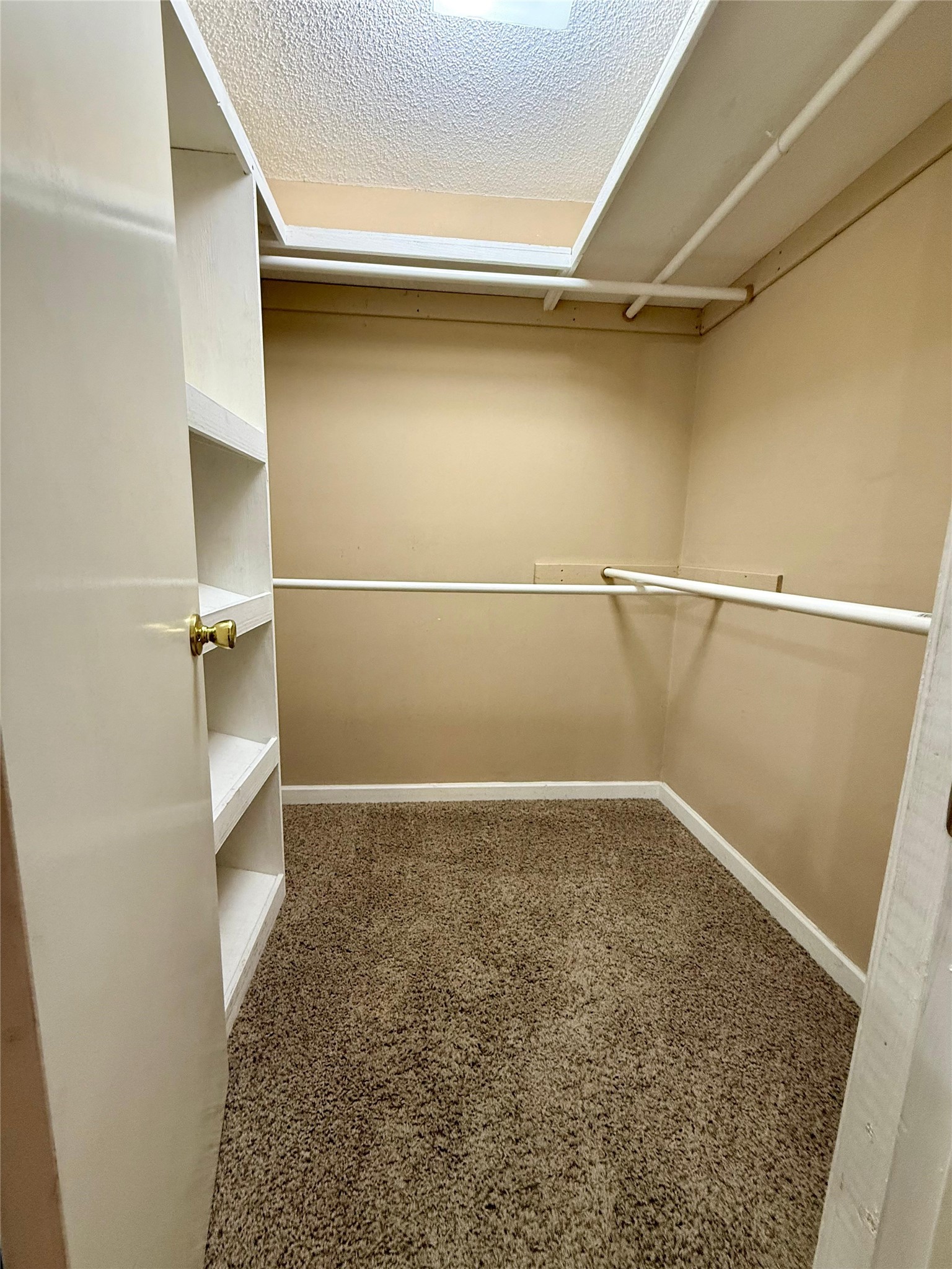 17903 Strack Drive East, Unit GARAGE Spring, TX 77379 - Photo 15 of 22 Walk-in closet with built in storage.