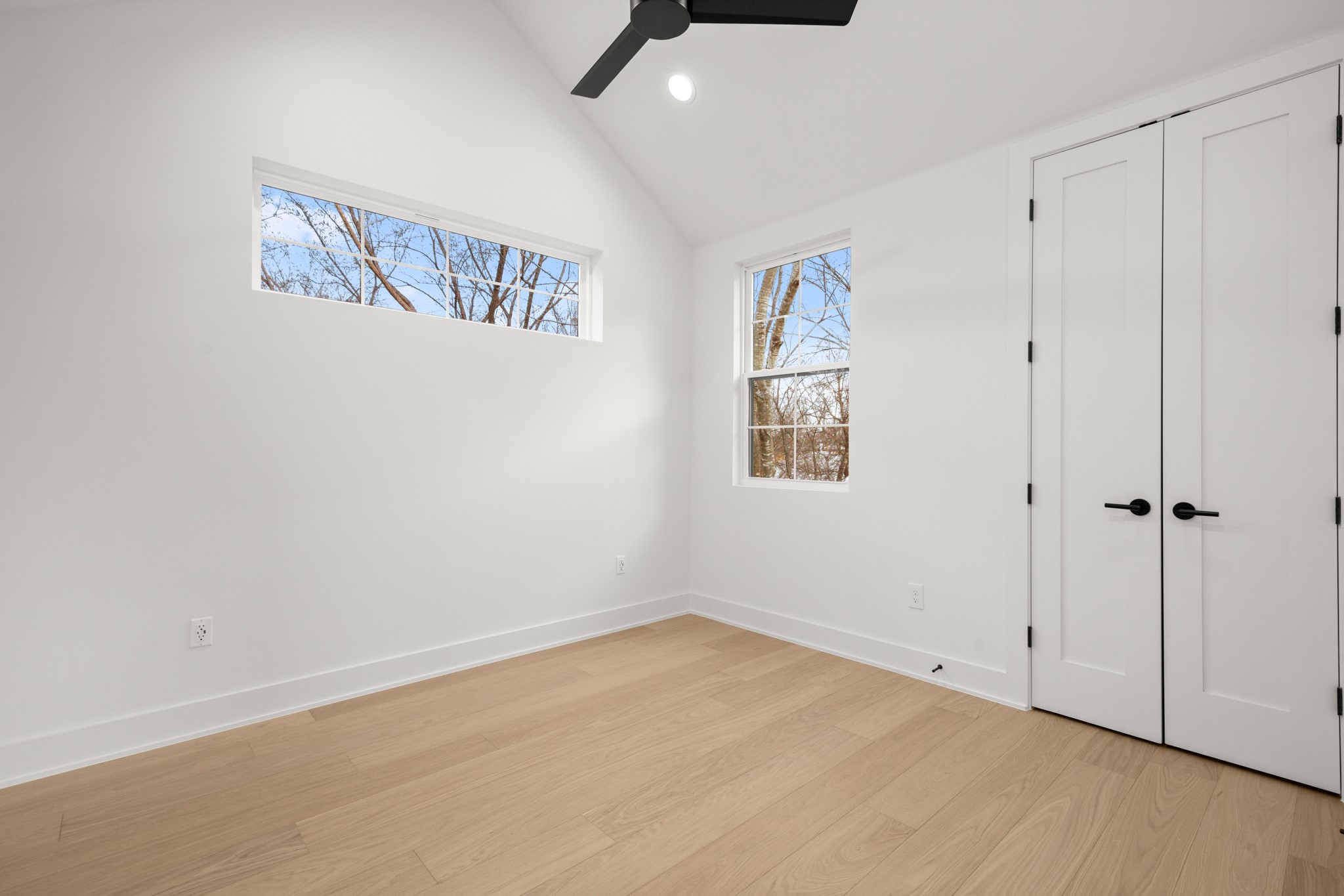 601 Vermont Road, Unit 2 Austin, TX 78702 - Photo 19 of 23 Vaulted ceilings featuring recessed lighting and a ceiling fan