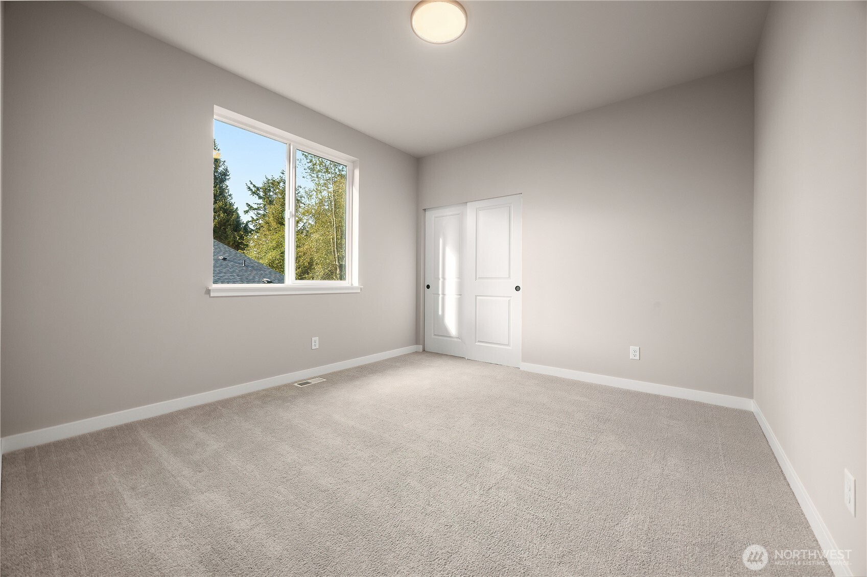 24226 Brier Road Brier, WA 98036 - Photo 29 of 35 an empty room with windows and plant