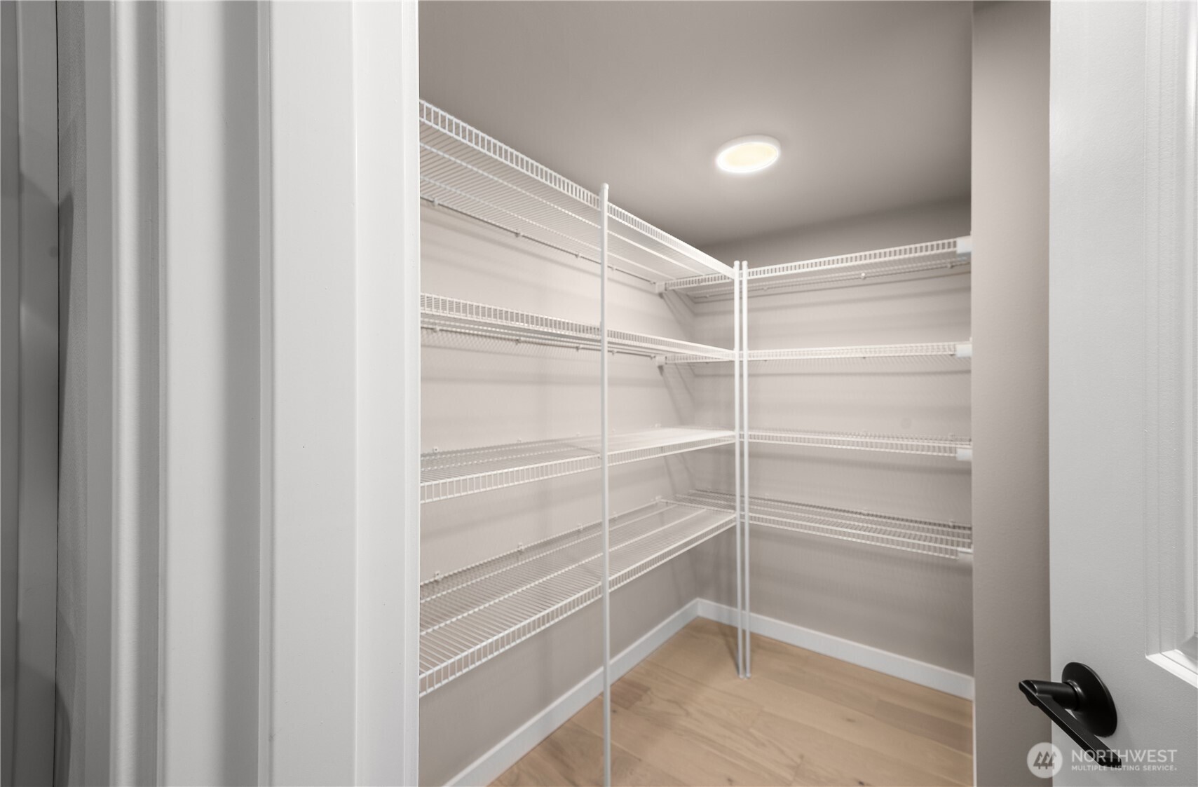 24226 Brier Road Brier, WA 98036 - Photo 10 of 35 a view of walk in closet with empty racks