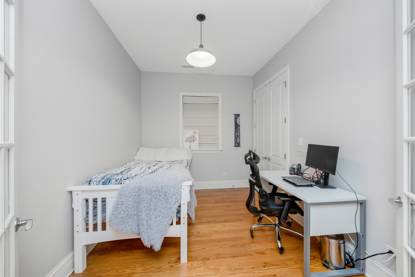 1238 West Jackson Boulevard, Unit 2W Chicago, IL 60607 - Photo 11 of 13 a workspace with furniture and wooden floor