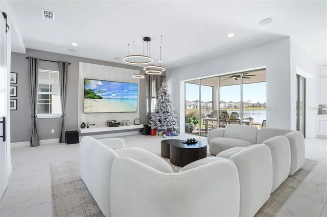 a kitchen with stainless steel appliances kitchen island microwave and cabinets