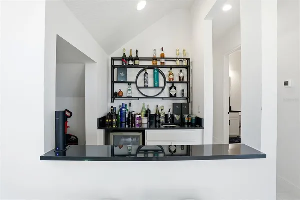 a bathroom with double sink and a mirror