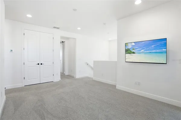 a bathroom with a sink toilet a shower and a mirror