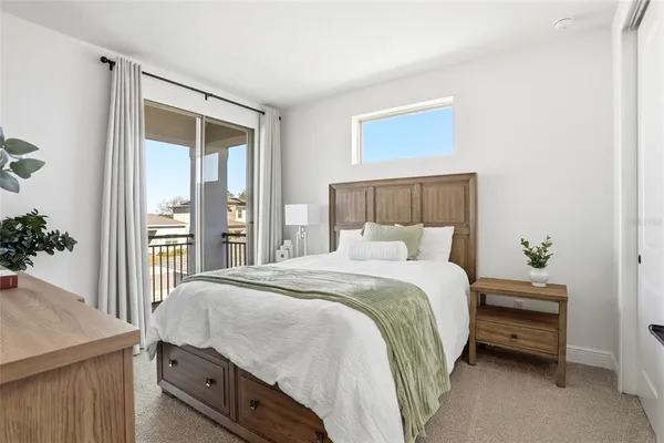 a bathroom with double sink shower and a mirror