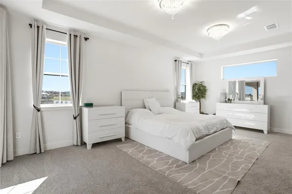 a view of a city with an ocean view