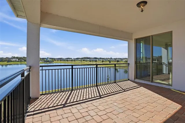 an aerial view of a ocean with houses