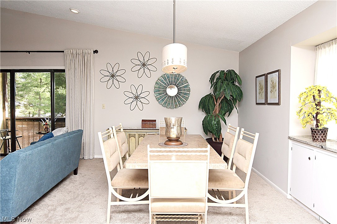 Dining area at end of Great Room with new light fixture