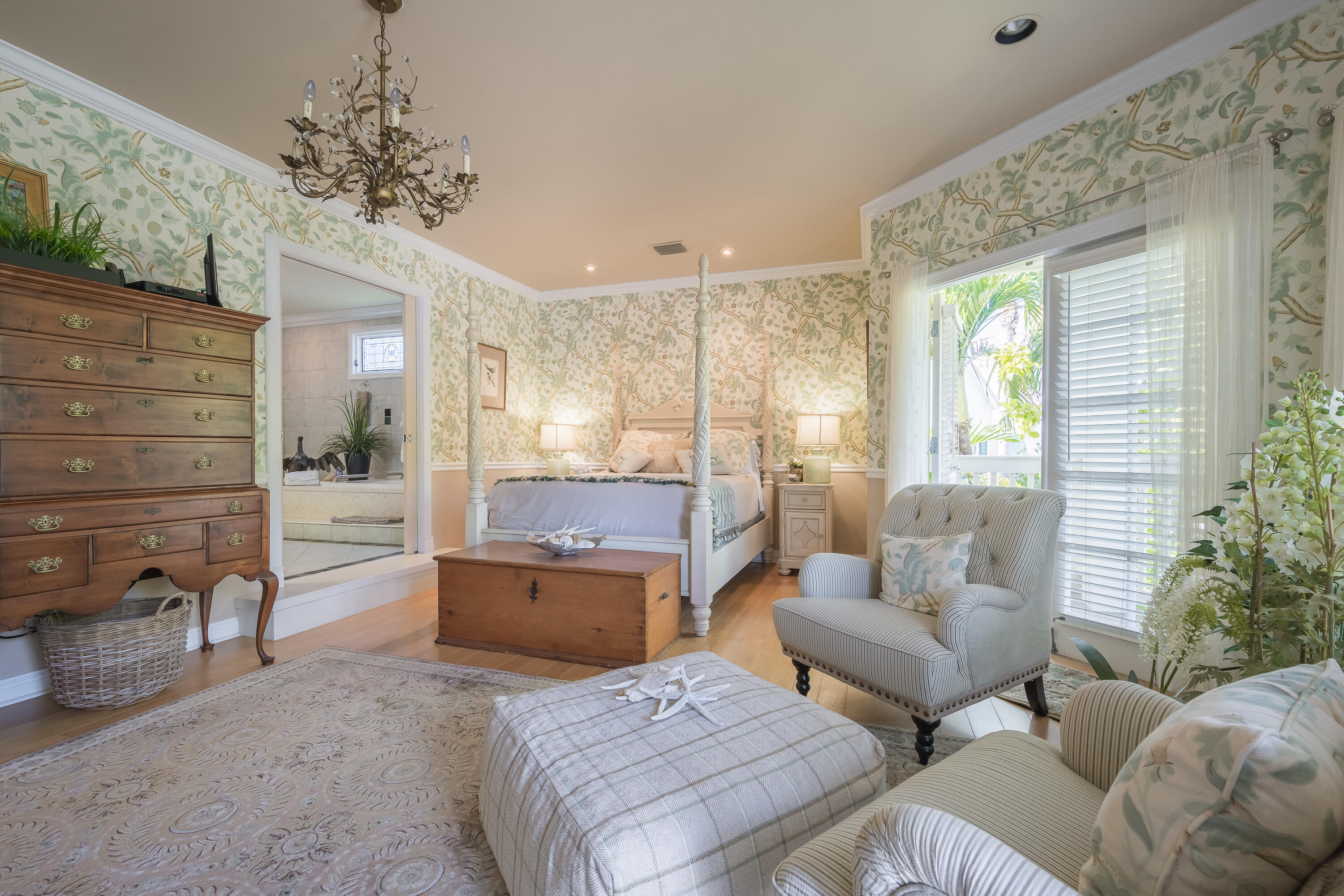 64 Front Street Key West, FL 33040 - Photo 4 of 5 a living room with furniture and a chandelier