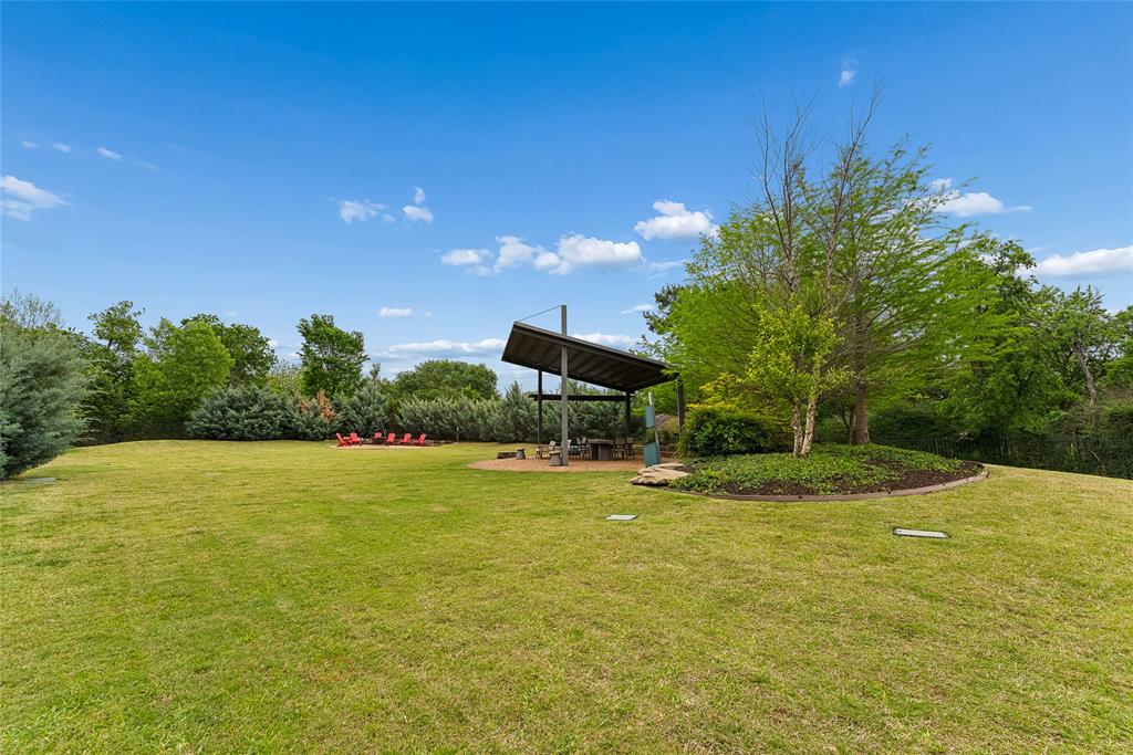 3922 Redding Row Dallas, TX 75220 - Photo 33 of 35 a view of a big yard with an trees