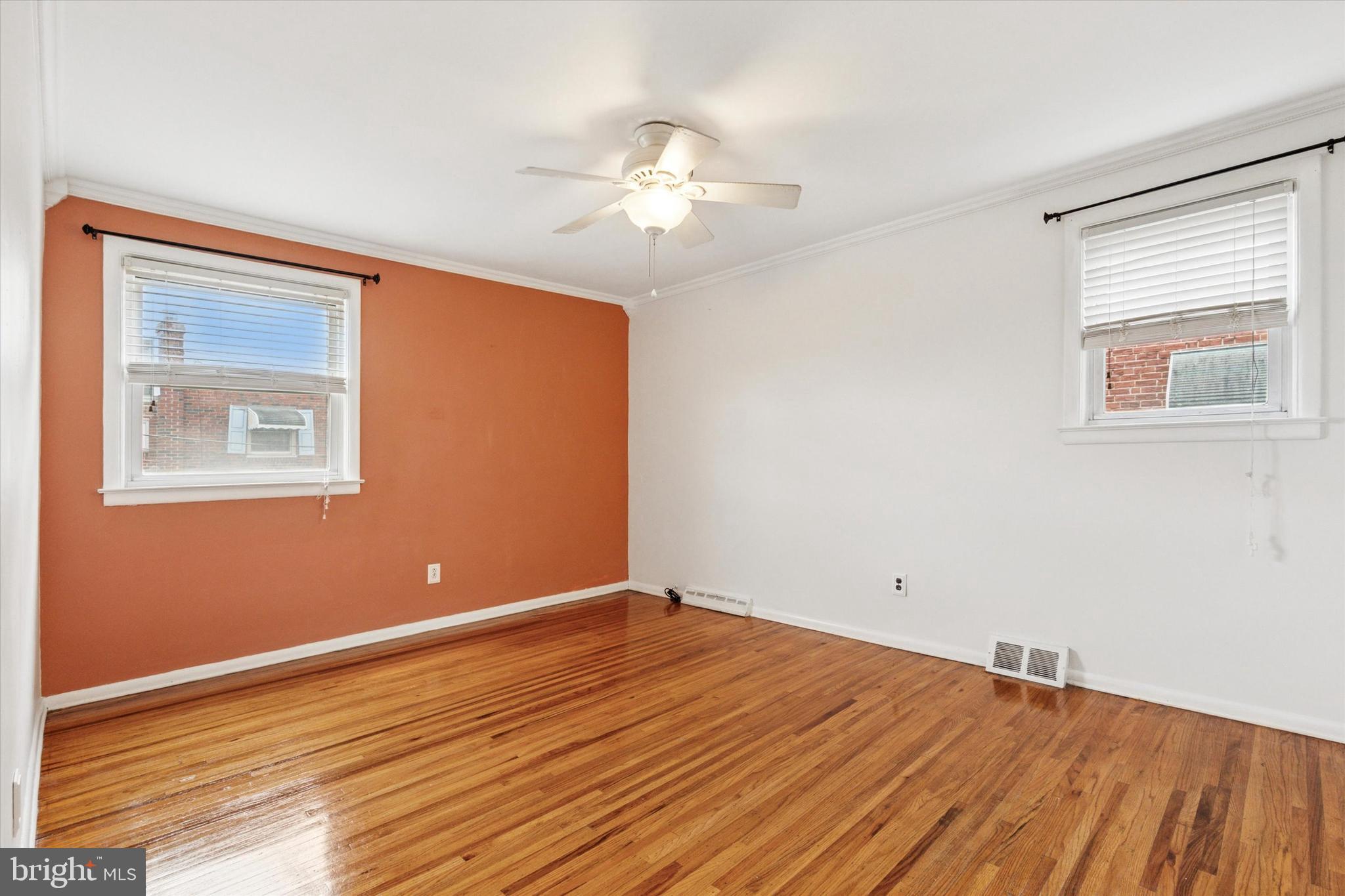 2678 Tremont Street Philadelphia, PA 19152 - Photo 14 of 24 a view of a room with wooden floor and fan