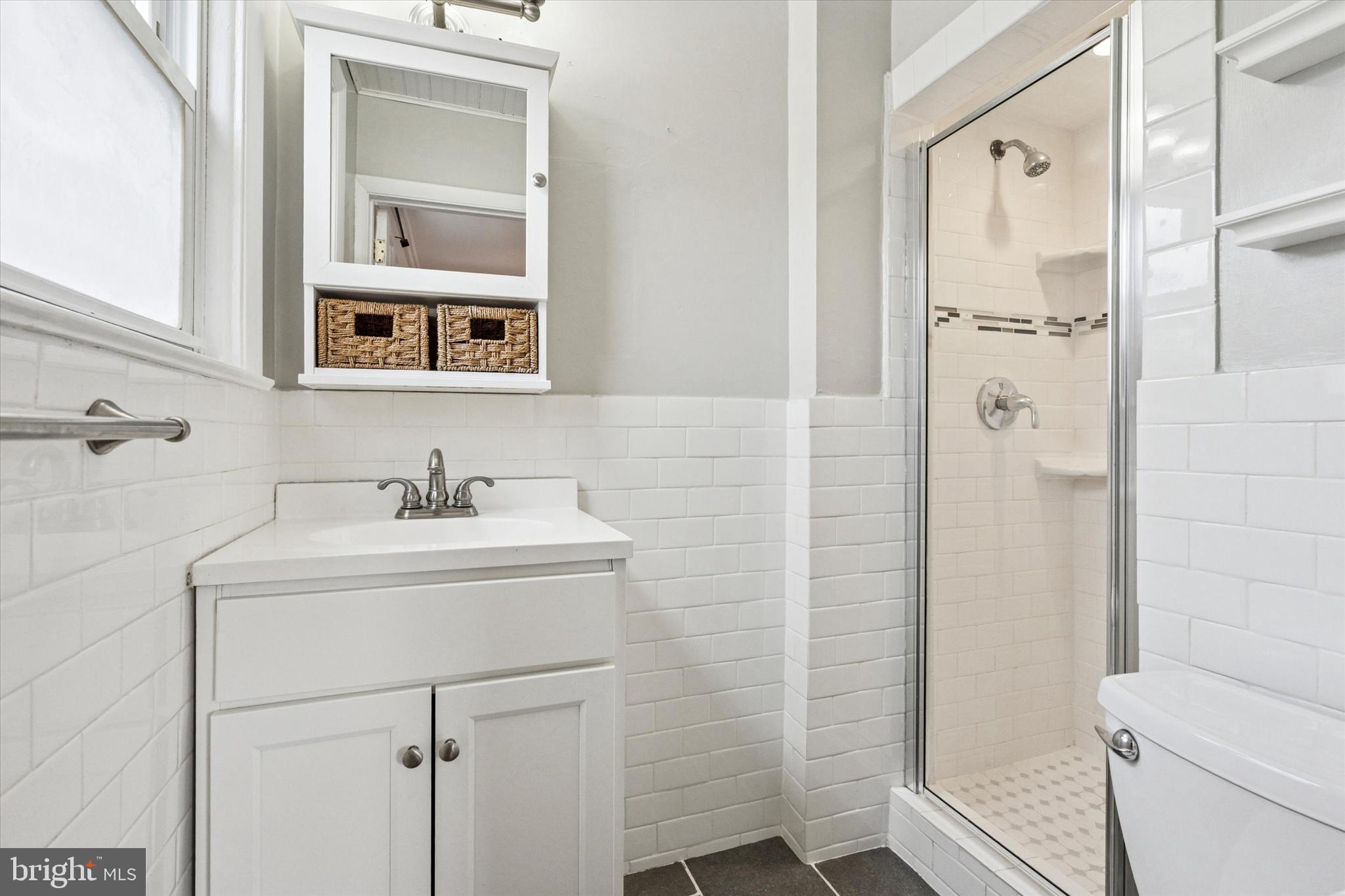 2678 Tremont Street Philadelphia, PA 19152 - Photo 16 of 24 a bathroom with a sink toilet and shower